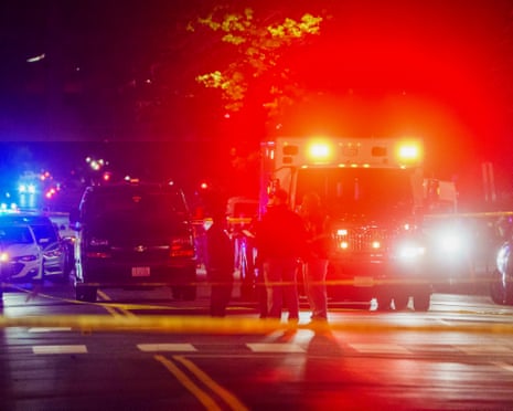 Police officers on the scene where two people were shot and killed near the Capital Jewish Museum in Washington, DC