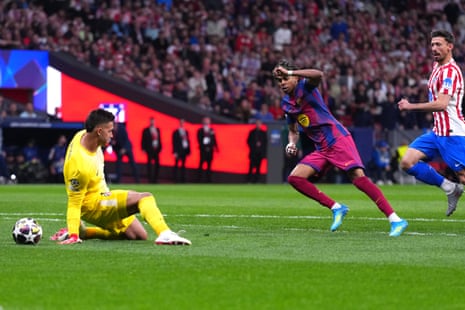 Barcelona’s Lamine Yamal slots the ball home to half the visitors’ deficit.