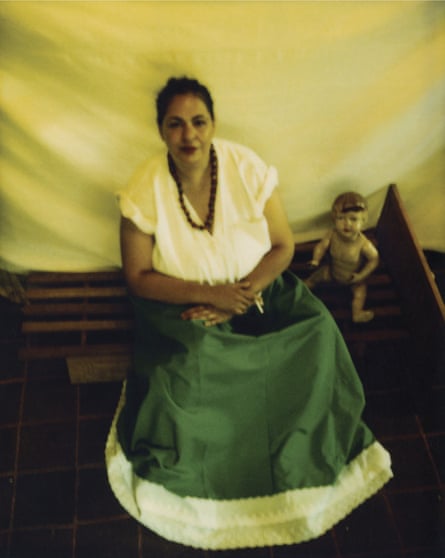 Destiny Deacon in her self-portrait titled ‘Me and Virginia’s doll (Me and Carol)‘, 1997 - 2004. In this image, Deacon presented herself as Frida Kahlo in an homage to Kahlo’s 1937 painting ‘Me and My Doll’.