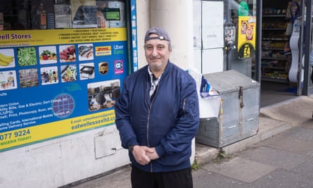 Ibrahim Soliman standing in front of a shop. Photo Sean Smith
