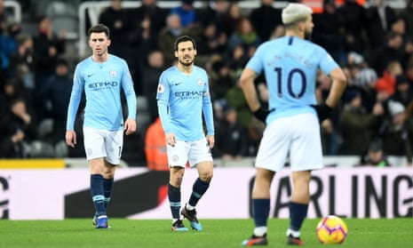 David Silva of Manchester City and Aymeric Laporte of Manchester City look dejected after Newcastle United score their second goal.