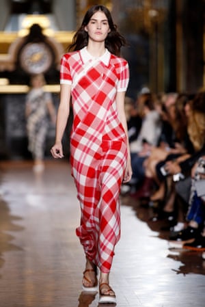 A red gingham dress with a polo shirt top