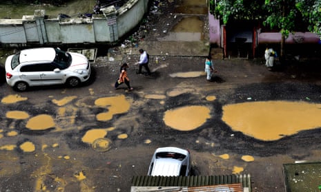 Huge potholes appear in Mumbai, India after heavy rains