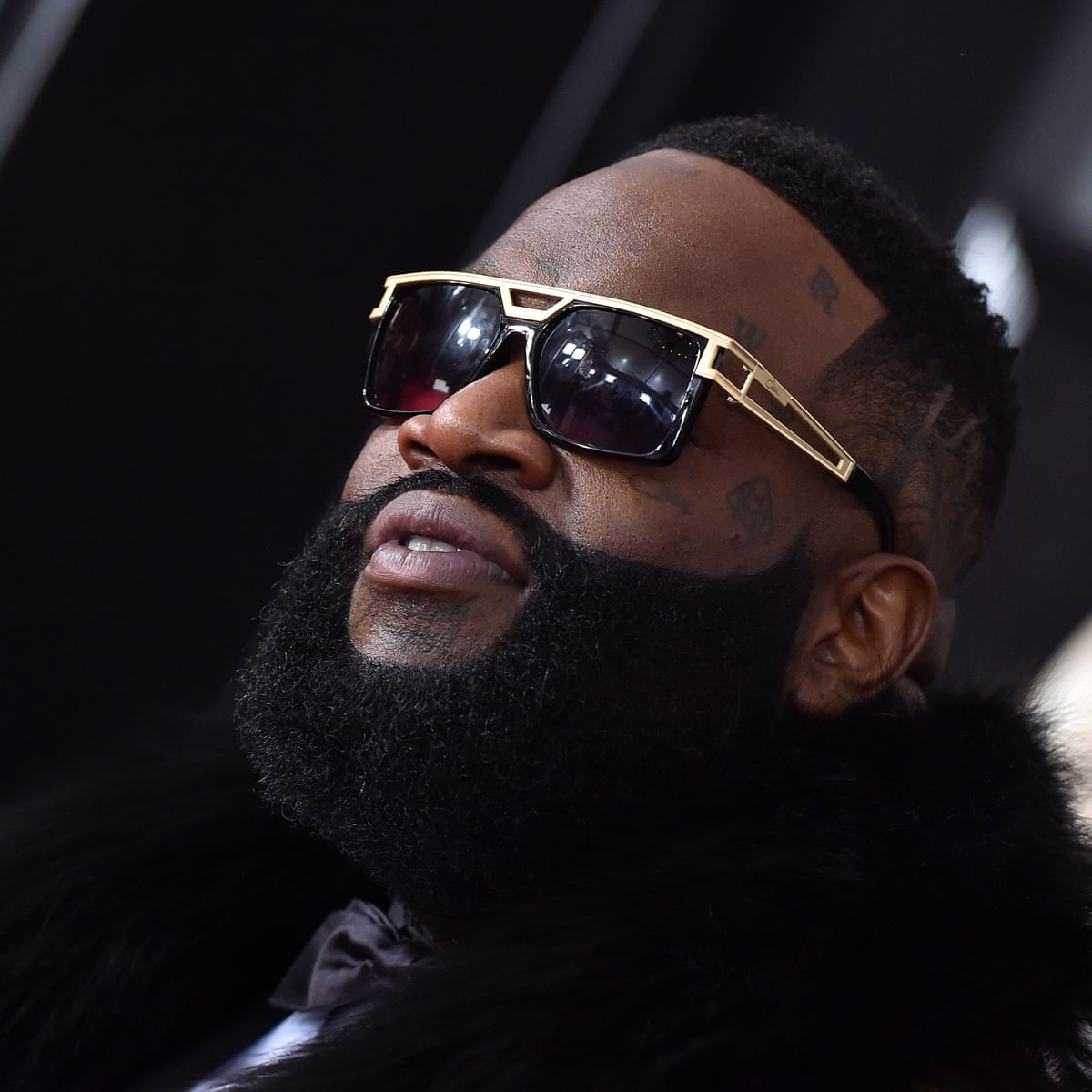 Rick Ross fans urged to pray for rapper after he is taken to hospital |  Hip-hop | The Guardian