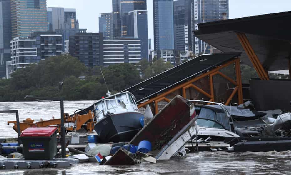 Brisbane flood: warning up to 15,000 properties could be inundated as river reaches peak | Brisbane | The Guardian