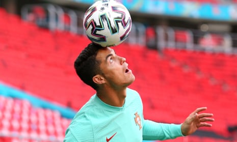Cristiano Ronaldo keeps his eye on the ball in training