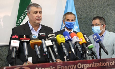 The head of the Iranian atomic energy association, Mohammad Eslami (left), with Rafael Grossi (centre) after their meeting in Tehran