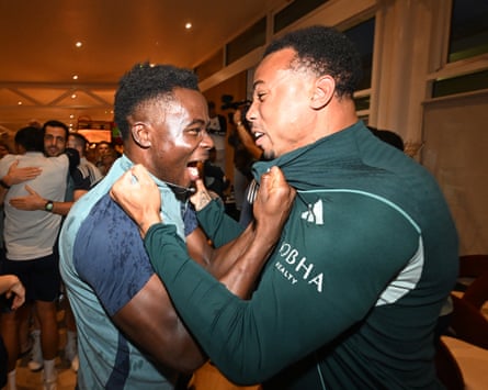 Bukayo Saka and Gabriel Magalhaes celebrate Arsenal winning the Premier League