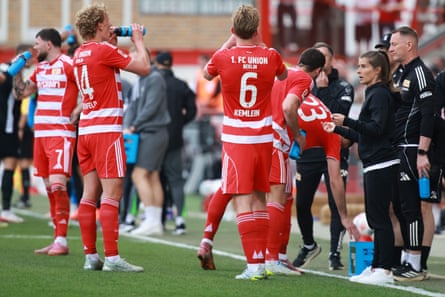 Marie-Louise Eta instructs her players during the Wolfsburg game