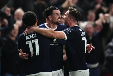 Tristan Crama (centre) is congratulated by his Millwall teammates after scoring against Birmingham