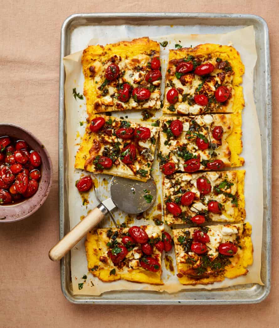 Yotam Ottolenghi’s baked polenta with bechamel, feta and za’atar tomatoes.