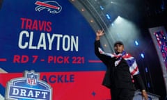 Travis Clayton reacts after being picked by the Buffalo Bills with the 221st overall pick in the seventh round during the third day of the NFL football draft, Saturday, April 27, 2024, in Detroit. (AP Photo/Jeff Roberson)