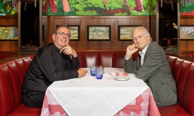 Rev Richard Coles and Richard Dawkins sitting at a table at the Colony Grill in London