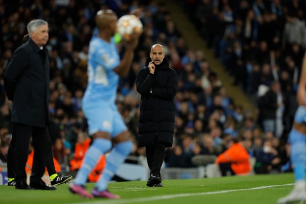 Pep Guardiola looks on during a night on which his Manchester City side should have won by more.