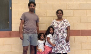 Nades (left) and Priya (right) Murugappan with their Australian-born daughters, Kopika, 5, and Tharunicaa, 3, at the detention centre on Christmas Island.