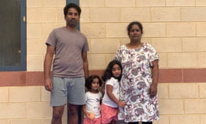 Nades (left) and Priya (right) Murugappan with their Australian-born daughters, Kopika, 5, and Tharunicaa, 3, at the detention centre on Christmas Island. 