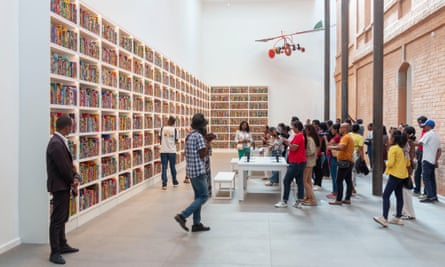‘I like pushing boundaries’: Yinka Shonibare on his landmark art show in Madagascar People looking around The African Library