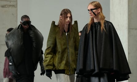 Models present Rick Owens fashion designs.