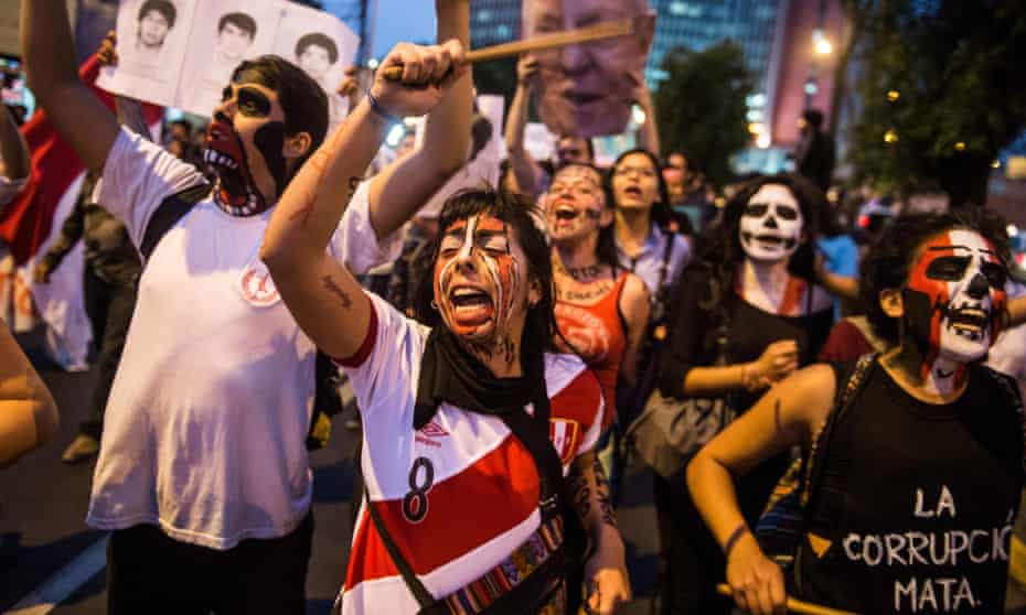Demonstrators protest against the pardon of former Peruvian president Alberto Fujimori in Lima on Thursday