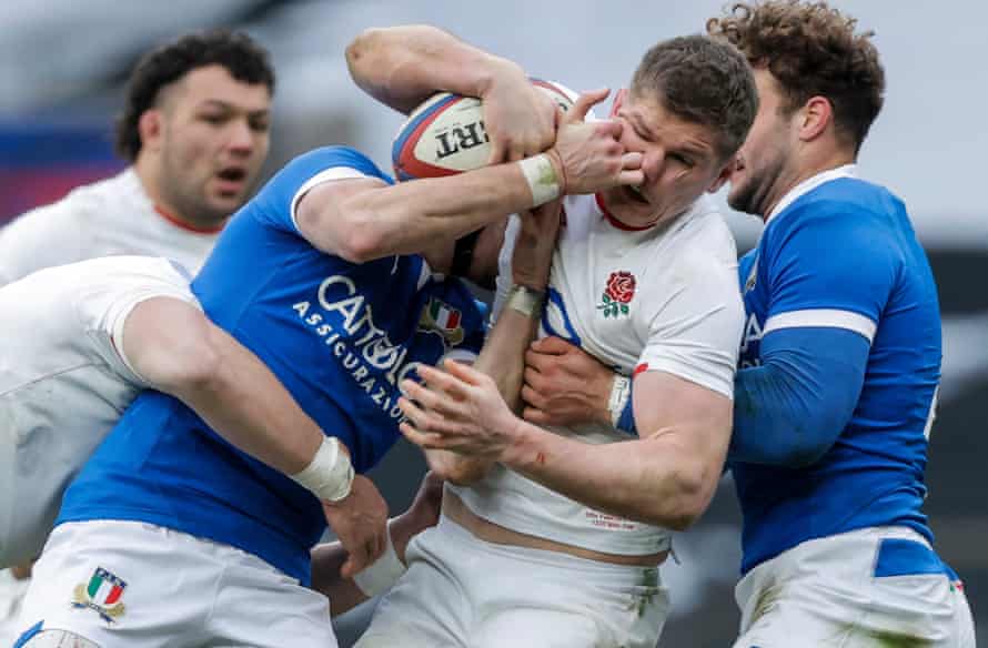 England captain Owen Farrell gets a hand in the face during the England v Italy Six Nations international rugby union match at Twickenham Stadium on February 12th 2021.