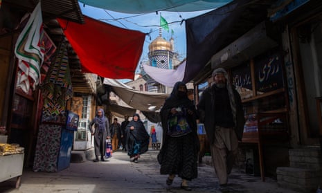 People walk through the bazaar in Murad Khani, Kabul’s old town; an area that has seen much destruction over the last decades, but is now being restored.
