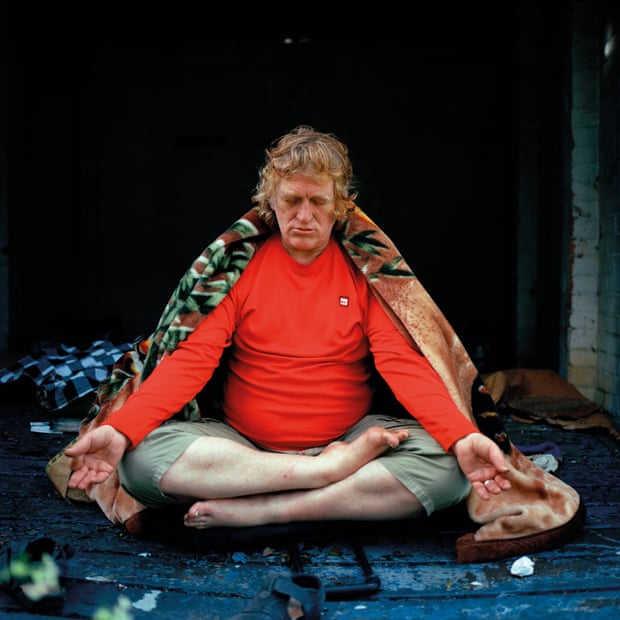 Justin meditating at ‘the den’, a disused garage near his art class in Roehampton.