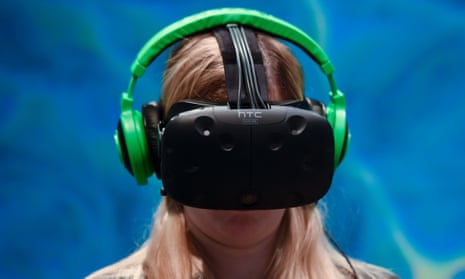A visitor tests the new ‘Vive steam VR’ virtual device at the HTC stand on the second day of the Mobile World Congress in Barcelona on February 23, 2016.