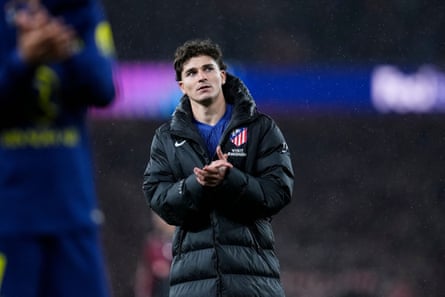 Julián Alvarez goes over to show his appreciation for the away fans after the match