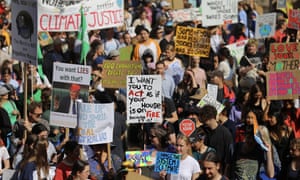 Some of the many signs protesters brought to the Sydney climate strike rally.