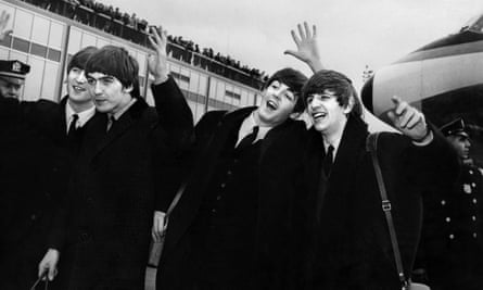 John Lennon, Ringo Starr, Paul McCartney, George Harrison arrive at JFK Airport, New York, in 1964.