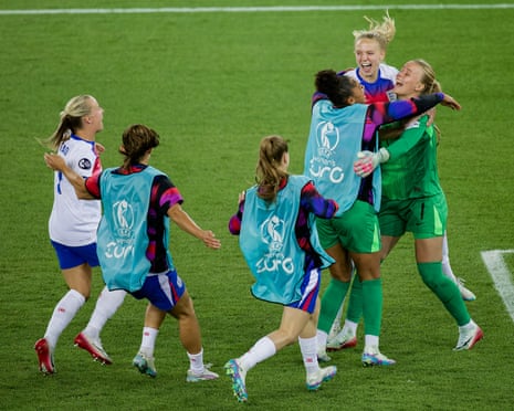England’s players celebrate after the quarter-final shootout win against Sweden