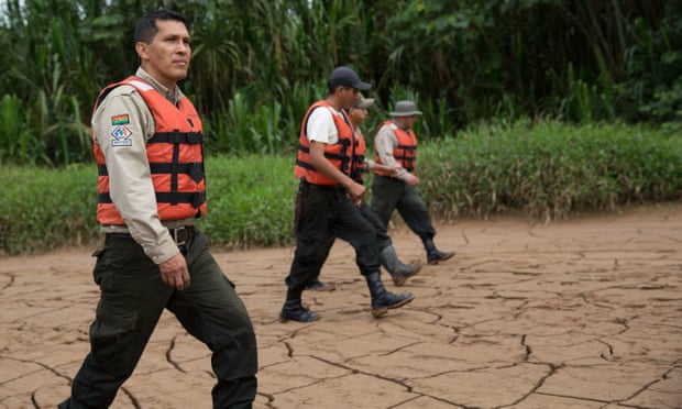 Marcos Uzquiano, director of Madidi national park, with fellow rangers, who track wildlife traffickers in the film. Photograph: Handout
