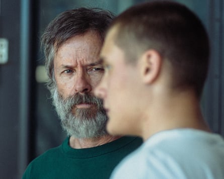 Guy Pearce and Vincent Miller in Inside.