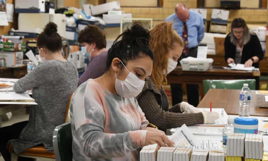 Ballots cast in Racine, Wisconsin are tabulated on Monday.