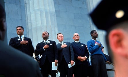 From left to right, Whitney Young Jr, Martin Luther King Jr, Walter Reuther, Dr Eugene Carson Blake and an unidentified man stand on the steps of the Lincoln Memorial in August 1963.