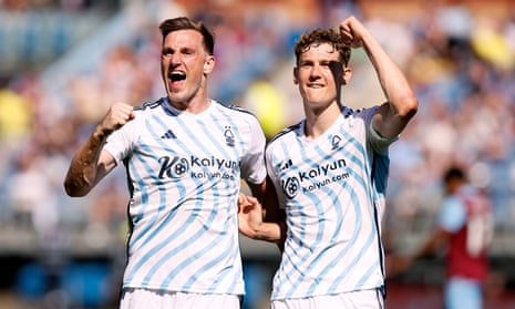 Chris Wood (left) celebrates scoring Nottingham Forest’s second goal with teammate Ryan Yates.