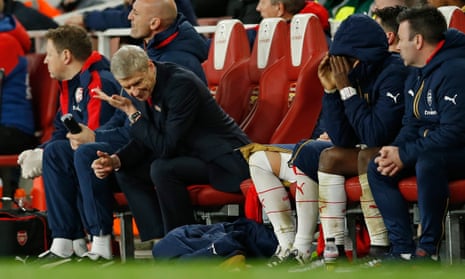 Arsene Wenger and the bench can’t bear to watch as City press for an equaliser.