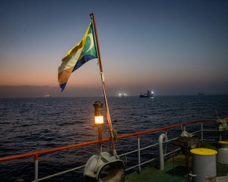 Oil tankers and cargo vessels anchored off the coast of Oman last month.