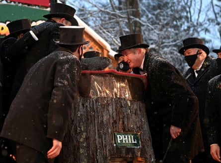 Punxsutawney Phil confers with members of his inner circle.