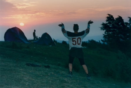 A lone rave greeting the sun