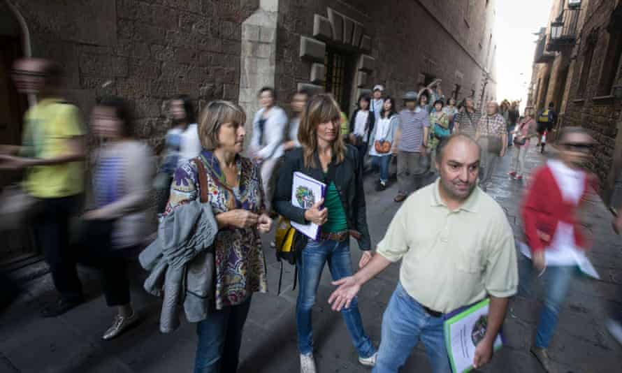 Tourists on a Hidden City Tours trip around Barcelona.