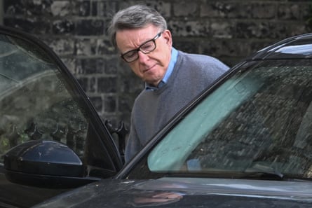 Peter Mandelson gets into a car outside his residence in central London