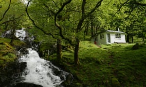 Cartref cabin in the woods and by a stream, Snowdonia, Wales, UK.