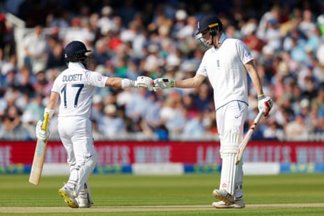 England's Zak Crawley (right) and Ben Duckett bump fists during their innings aginst Ireland on day one of the first Test at Lord's.