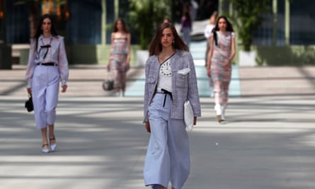 Models present creations from the 2020 Chanel Cruise collection.