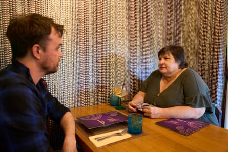 Keith and Amanda chatting across a restaurant table