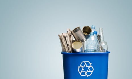 full blue recycling bin with the three arrows on it