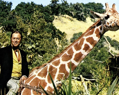 Rex Harrison rides a giraffe in Doctor Dolittle (1967).