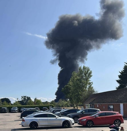 Smoke rises after the plane crash at Southend airport