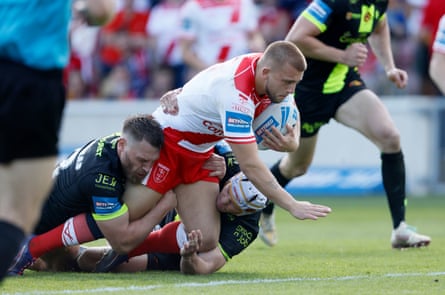 The outstanding Mikey Lewis goes over for Hull KR’s third try against Catalans.